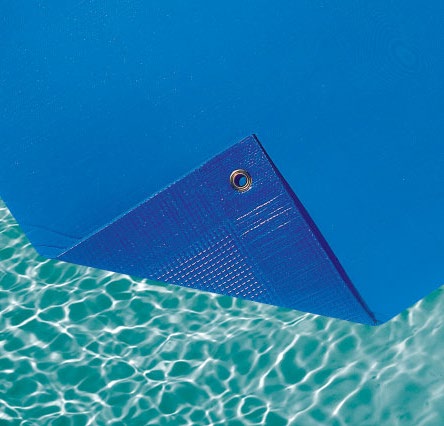 Close-up of blue pool liner material with a metal eyelet, over sunlit water