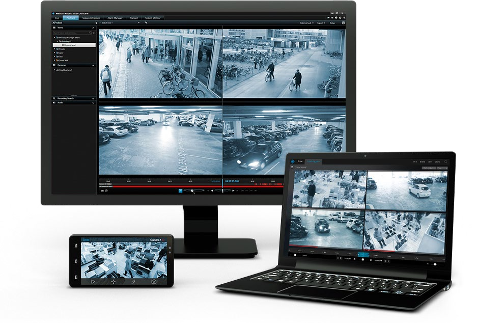 Milestone XProtect video management software shown on a monitor, laptop and tablet