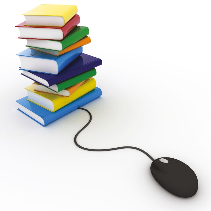 A stack of coloured books with a computer mouse cable running into it